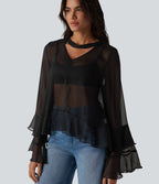 Chemise casual transparente col V manches longues à volants