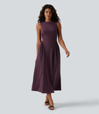 Robe midi casual fluide sans manches à col rond avec poches