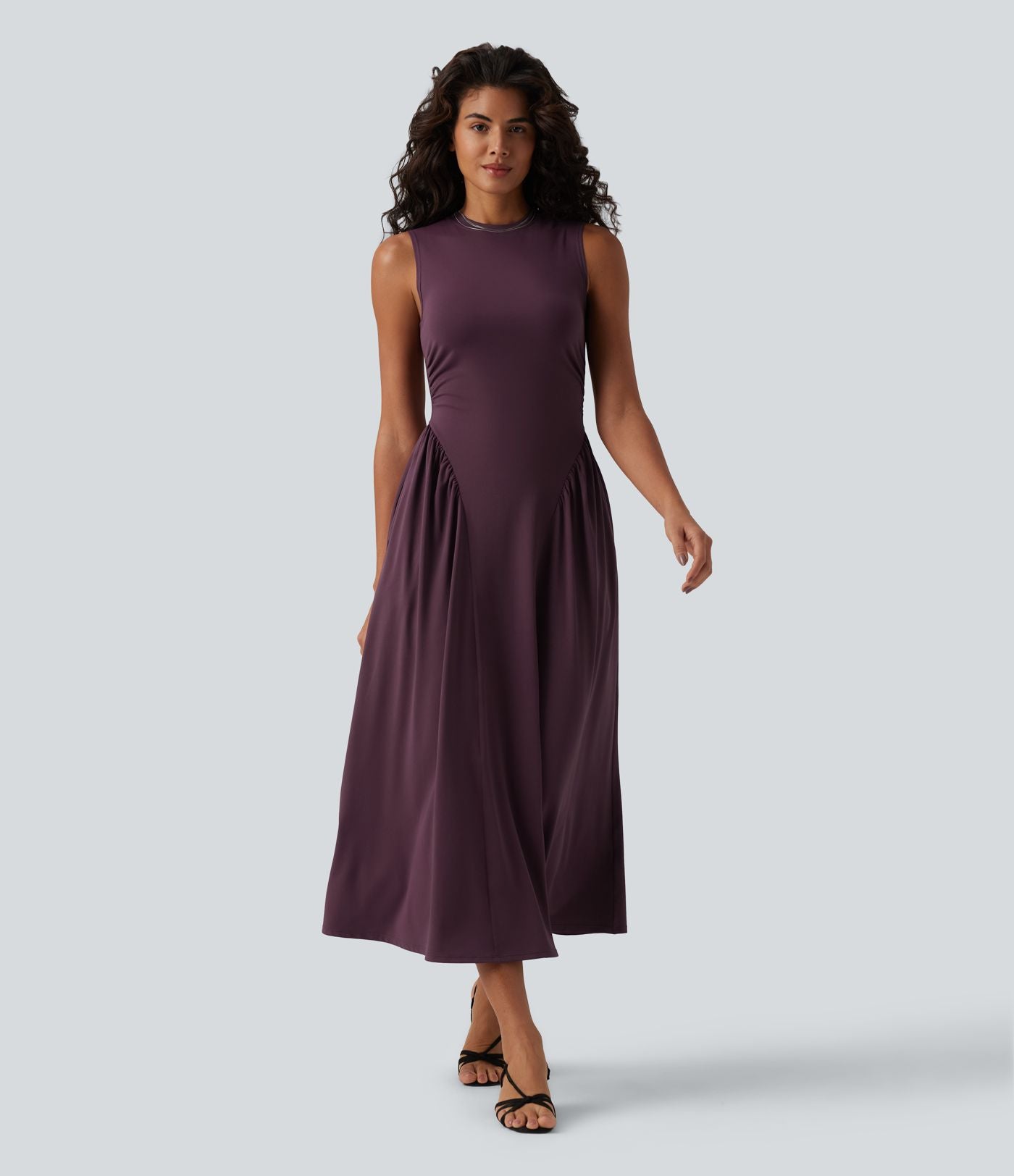 Robe midi casual fluide sans manches à col rond avec poches