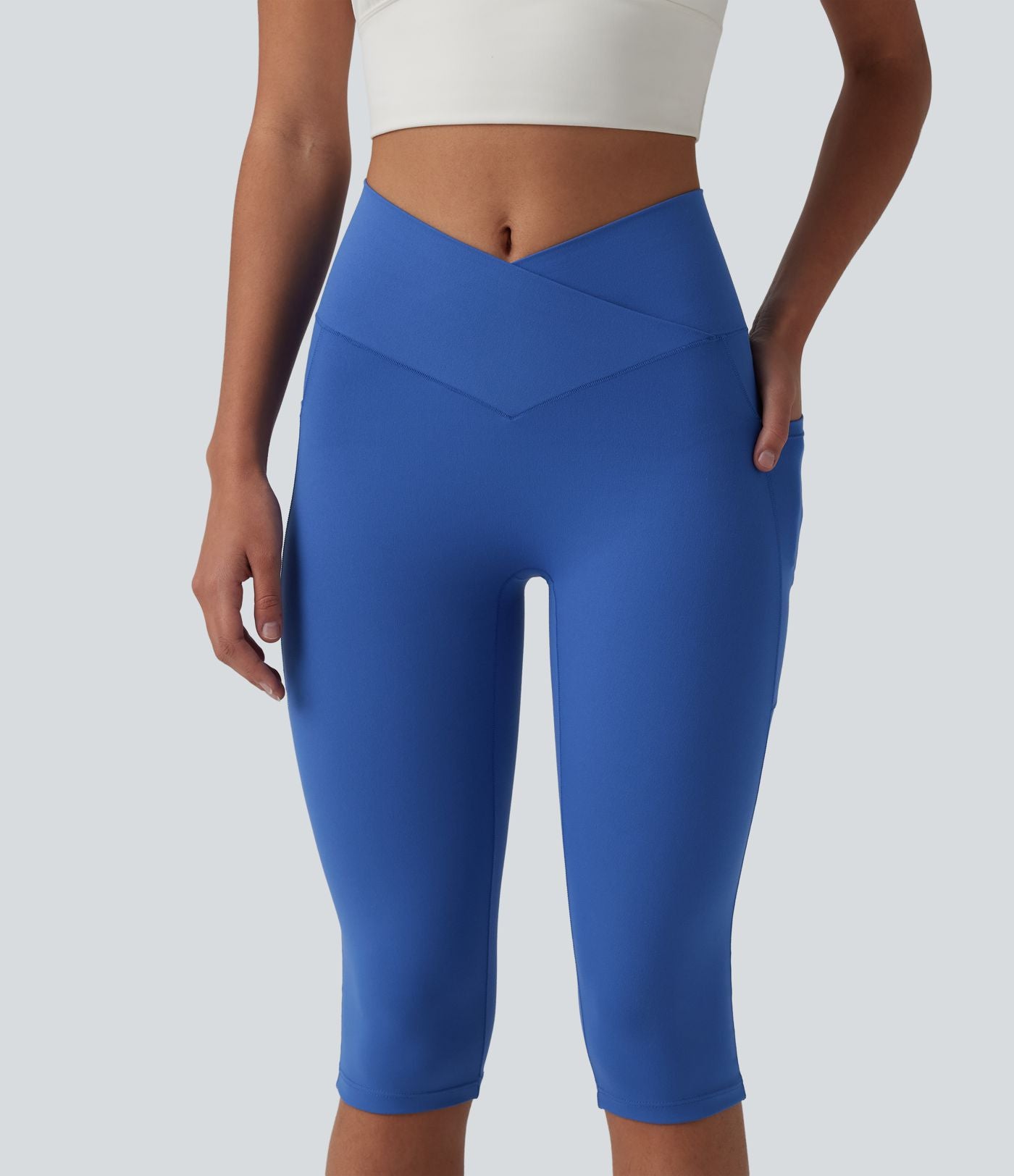 Legging de yoga corsaire SoftlyZero™ taille haute croisé avec poches - UPF50+