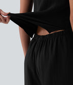 Combinaison casual aspect lin col rond échancré sans manches avec nœud frontal et poches – Easy Peasy
