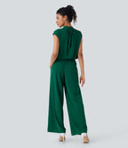 Combinaison pantalon tailleur jambes larges col montant dos goutte d'eau manches courtes avec poches latérales
