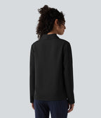 Blouse esprit bureau défroissage facile, col V, manches longues et lien à nouer