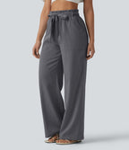 Pantalon décontracté effet lin taille haute, coupe droite, ceinturé avec finitions ondulées et poches