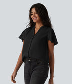 Blouse casual col V à manches volantées et ourlet arrondi