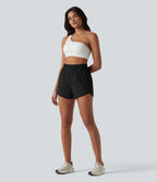 Short de yoga 7,5 cm taille haute à ourlet arrondi et poches