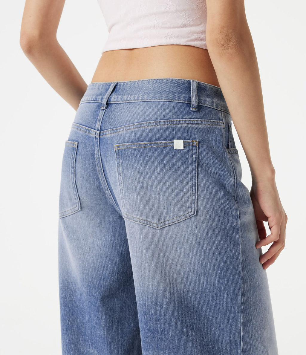 Jean baggy Halara Flex™ taille basse délavé asymétrique avec poches