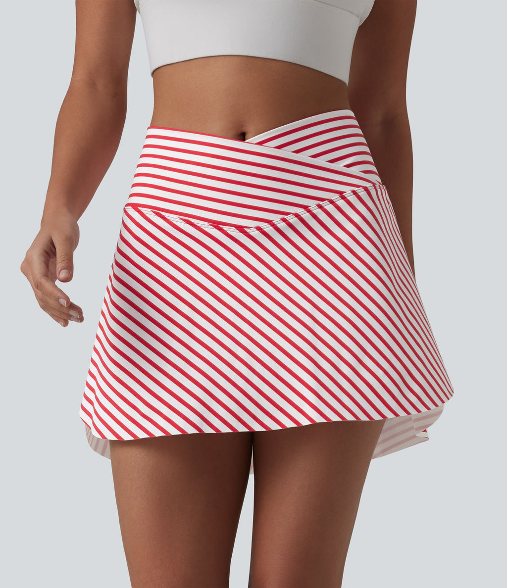 Jupe de tennis mini 2 en 1 à rayures, taille haute croisée, ourlet arrondi et poches