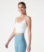 Caraco de yoga court col rond échancré avec brassière intégrée et ourlet croisé