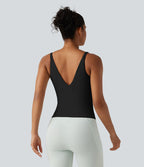 Débardeur de sport effet lissant sous les bras avec dos en V et brassière intégrée