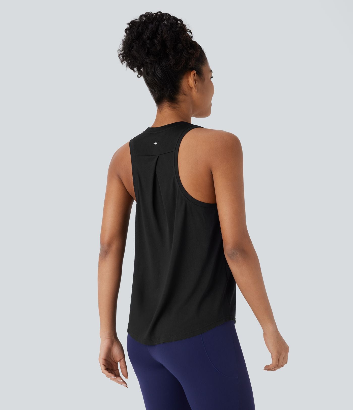 Haut de sport pour yoga à dos nageur et ourlet arrondi