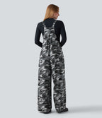 Salopette en maille gaufrée imprimé camouflage avec poches