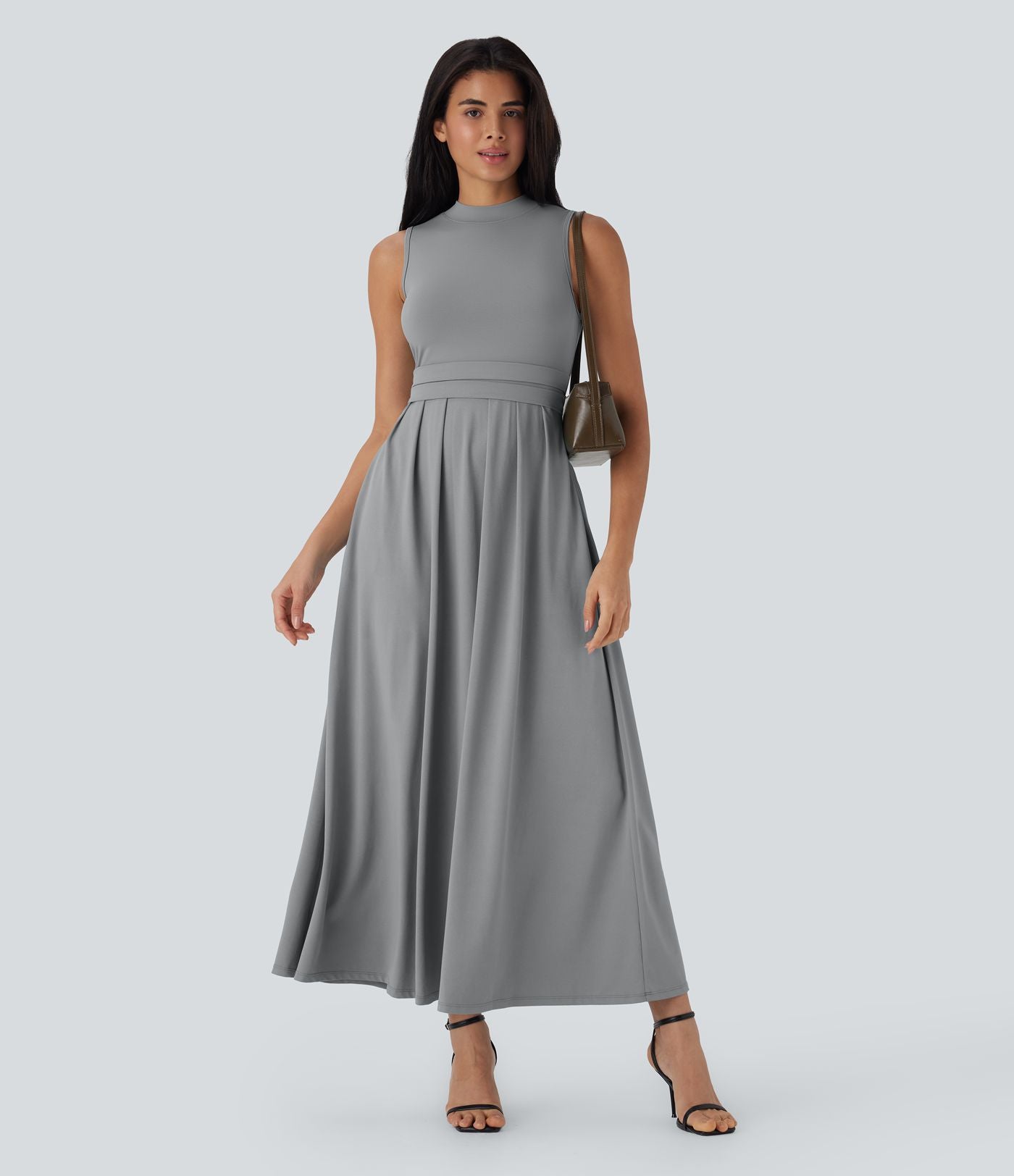 Robe longue décontractée sans manches à col montant, coupe évasée et poches latérales