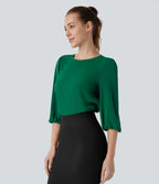 Blouse de travail col bateau avec manches évêque et dos ajouré
