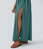Robe longue fluide fendue avec poches latérales, dos nu et effet torsadé
