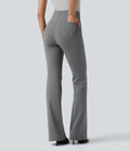 Pantalon tailleur évasé à rayures taille haute avec poches