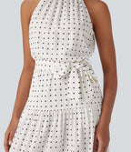 Robe mi-longue fluide de vacances à pois avec col licou, découpe dos, ceinture et poches latérales