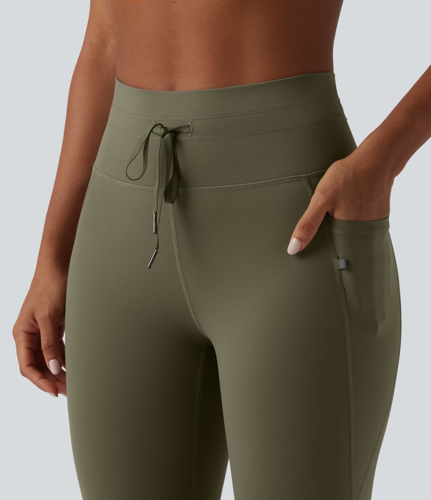 Legging 7/8 de yoga taille haute avec cordon de serrage uni et poches