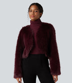 Manteau cape fausse fourrure col V manches longues