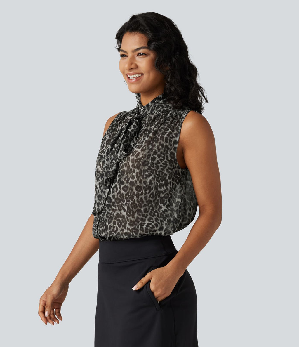Blouse de travail en mousseline col cheminée avec nœud, sans manches, imprimé léopard