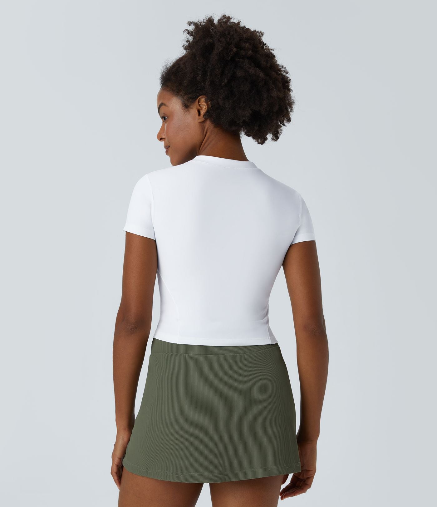 Haut de sport golf SoftlyZero™ Airy à manches courtes à demi-zip et effet frais InstantCool