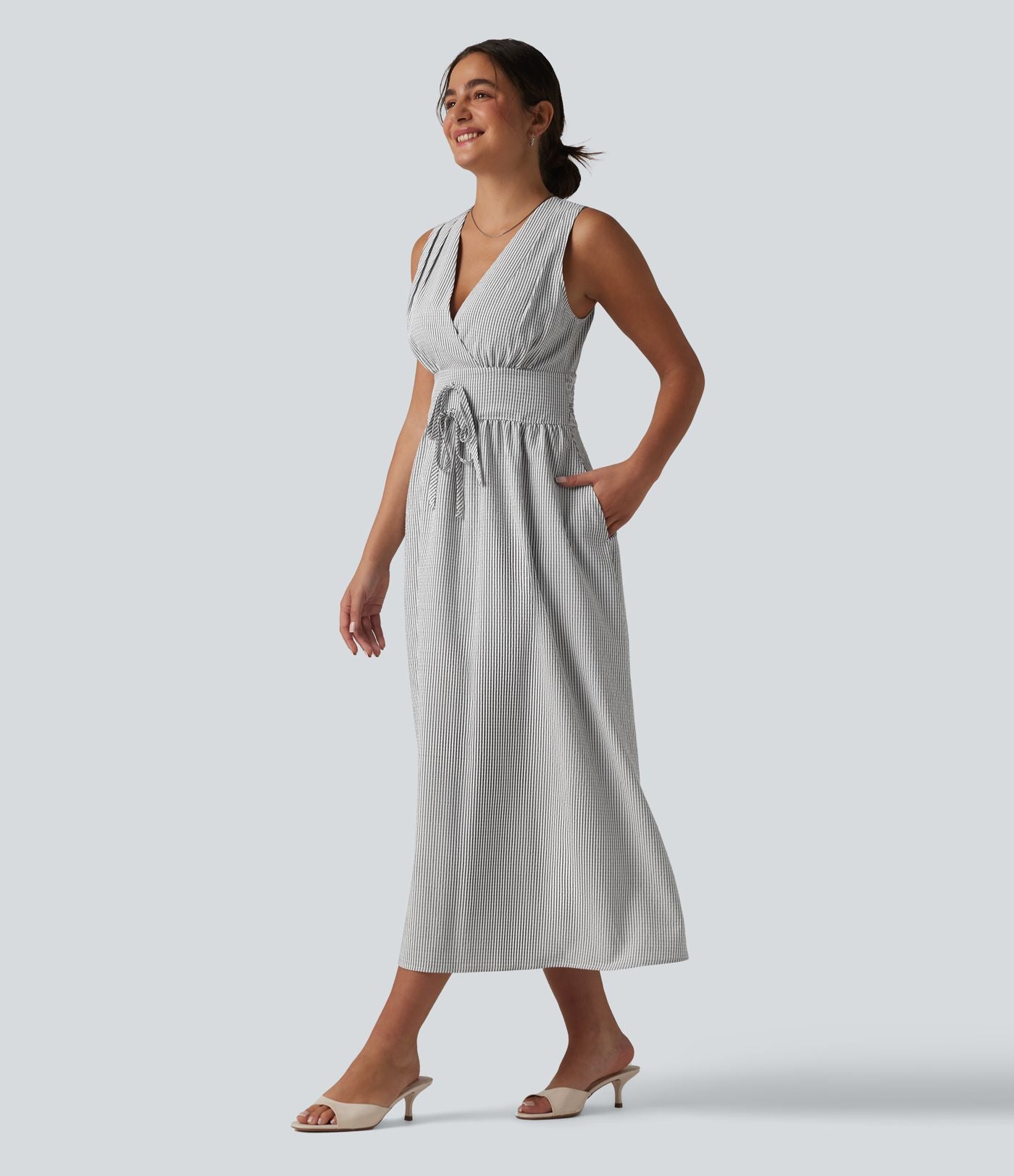 Robe midi rayée sans manches à col en V et poches
