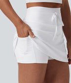 Jupe de tennis SoftlyZero™ Airy mini 2-en-1 gainante taille haute à cordon de serrage et effet frais InstantCool avec poches