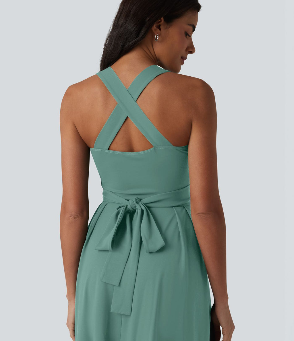 Robe midi fluide sans manches décolleté cœur avec bretelles croisées, nœud dans le dos et poches