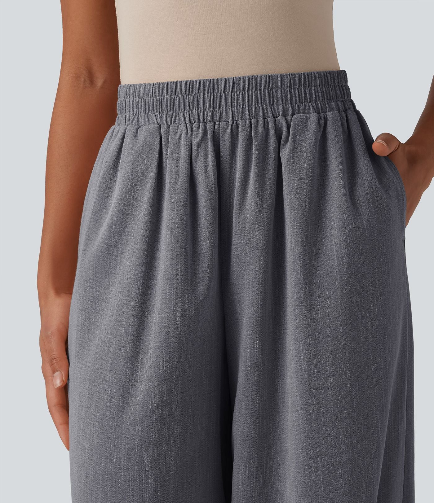 Pantalon décontracté coupe ballon taille haute aspect lin avec poches