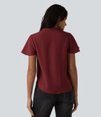 Blouse casual col V à manches volantées et ourlet arrondi