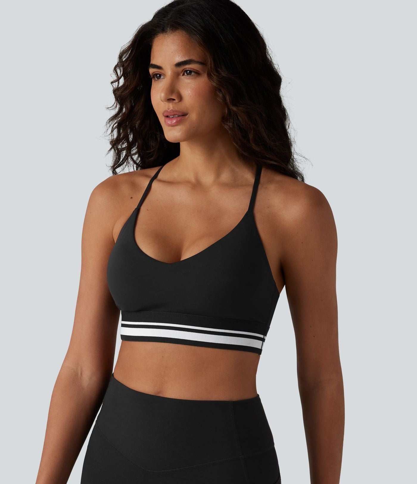 Brassière de sport SoftlyZero™ Plush à maintien léger, dos croisé ouvert, rayures color block et soutien intégré