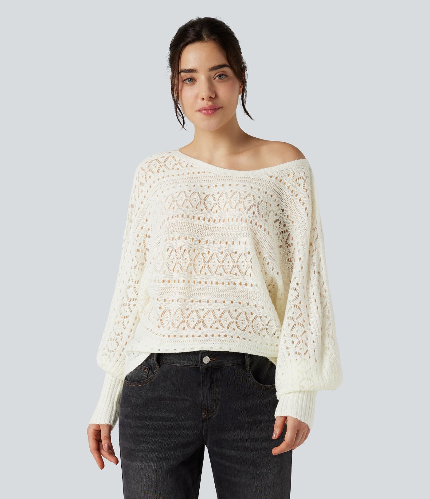 Pull ajouré col rond manches chauve-souris longues