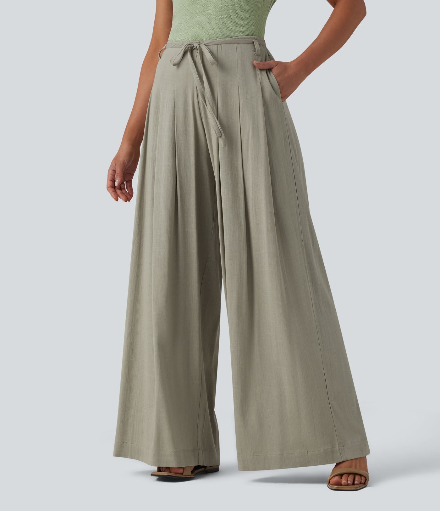 Pantalon large fluide taille mi-haute aspect lin avec ceinture et poches