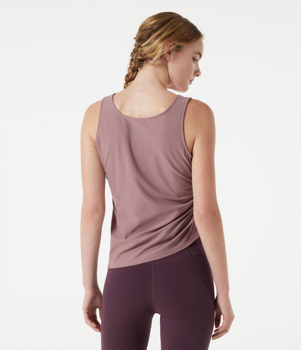 Débardeur de yoga col V avec ourlet asymétrique et fronces latérales