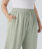 Pantalon décontracté grande taille large fluide taille haute effet lin avec cordon de serrage et poches