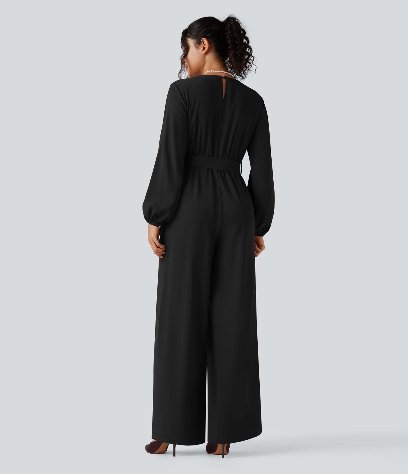 Combinaison pantalon de soirée large à décolleté en V, manches longues bouffantes, ceinture et poches