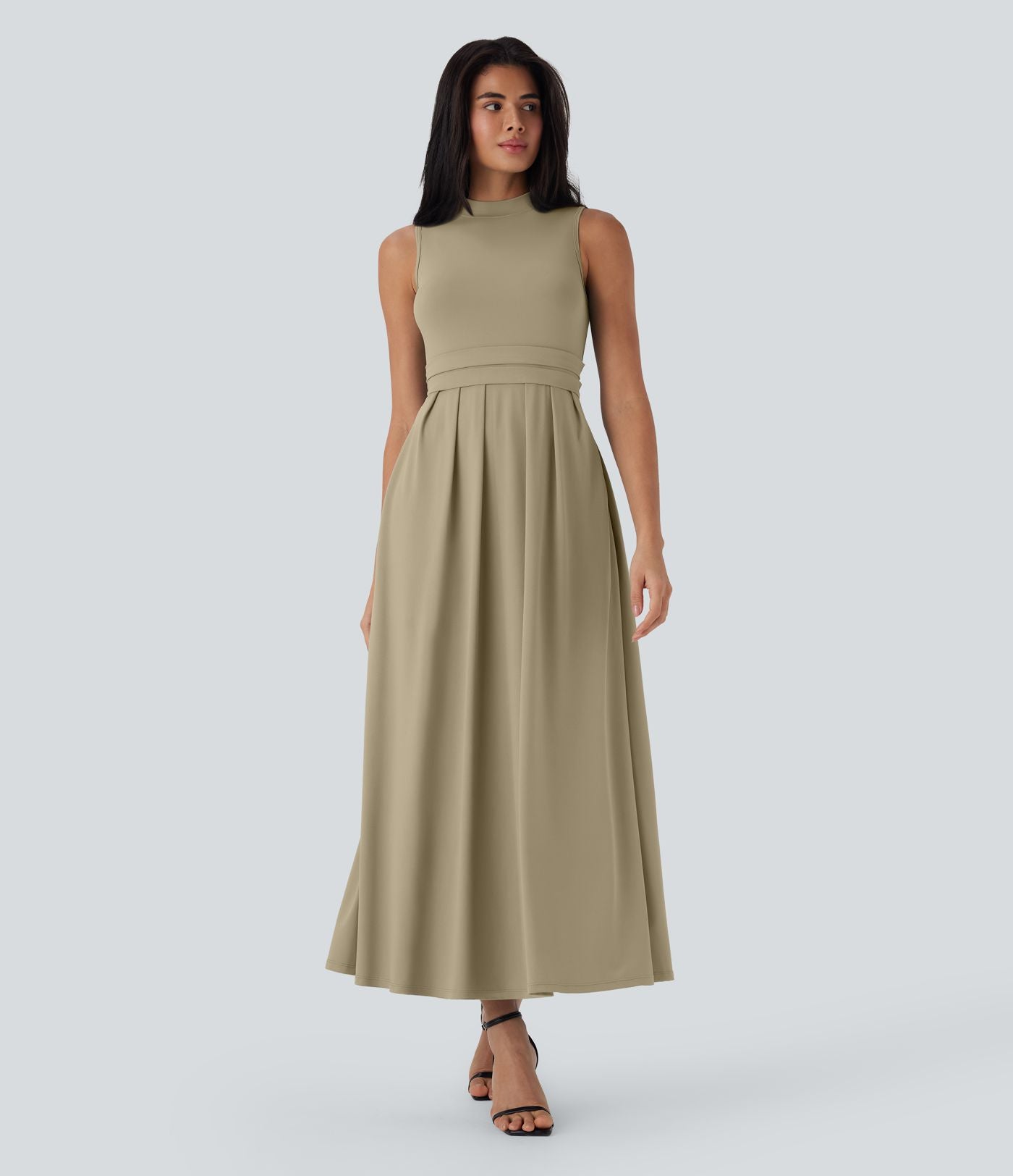 Robe longue décontractée sans manches à col montant, coupe évasée et poches latérales