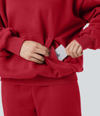 Sweat à capuche en coton molleton manches longues avec poches