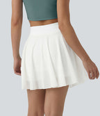 Jupe mini fluide évasée 2-en-1 taille haute à cordon, empiècements en mesh contrastant, avec poche, version plus longue