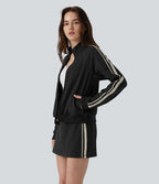 Veste de sport DayStretch col montant color block à rayures avec poches