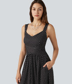 Robe fluide décontractée midi sans manches dos nu croisée à pois avec poches