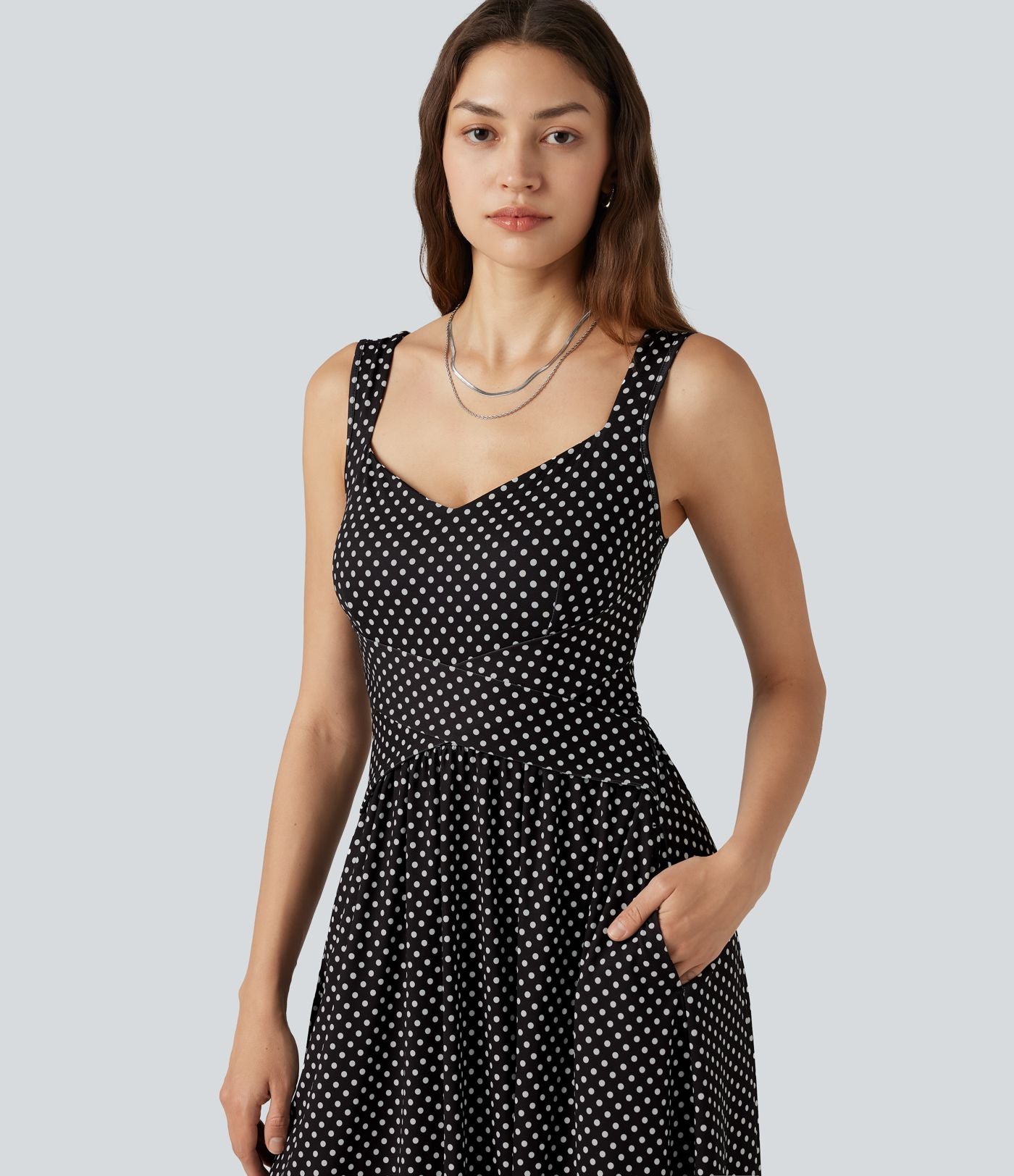 Robe fluide décontractée midi sans manches dos nu croisée à pois avec poches