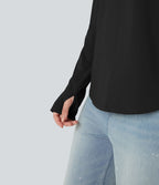 T-shirt décontracté en coton à col rond, manches longues raglan avec passants pouces et ourlet arrondi, coupe ample
