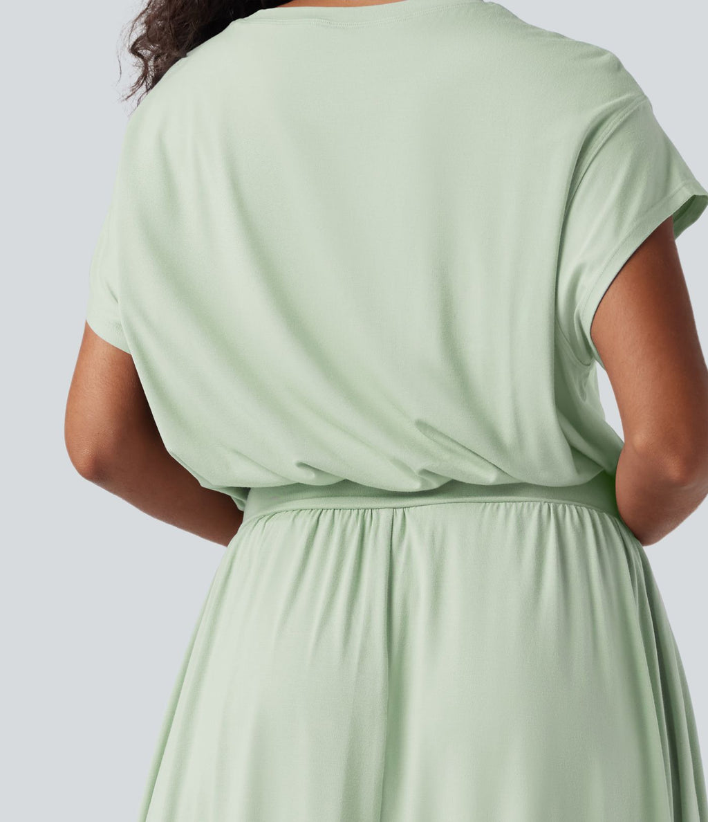 Robe de travail mi-longue fluide gainante à manches chauve-souris avec poches