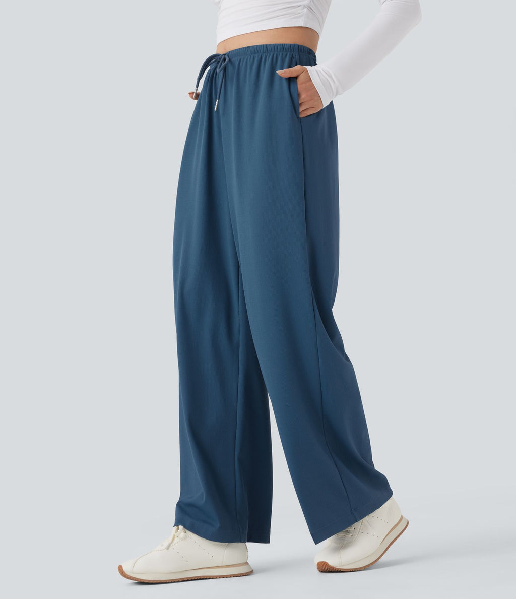 Pantalon de yoga tissu gaufré taille mi-haute jambe droite avec cordon de serrage et poches