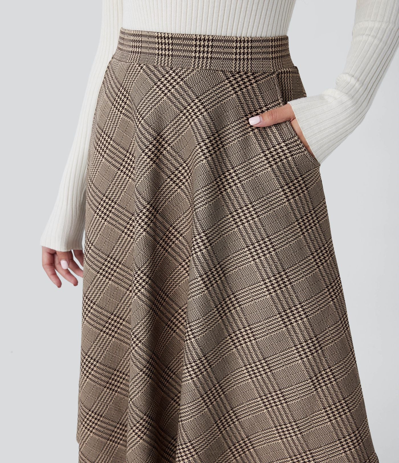 Jupe midi évasée à taille haute et poches latérales, motif pied-de-poule
