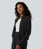 Veste casual côtelée à col montant, manches longues et fermeture zippée avec poches