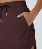 Mini-Jupe Golf Taille Haute Cordon de Serrage Poches Latérales Ourlet Courbé 2 en 1
