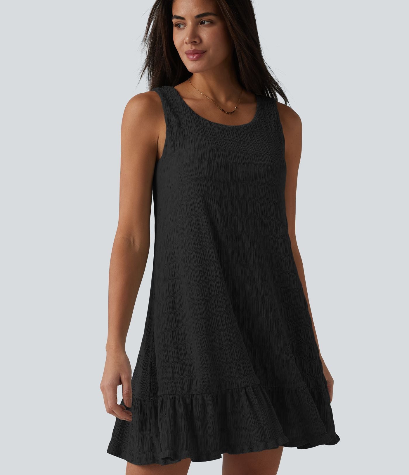 Robe courte décontractée sans manches à col rond, soutien-gorge intégré et ourlet à volants