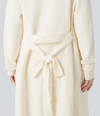 Robe d'intérieur longue tricot ouverte ceinturée manches longues avec poches